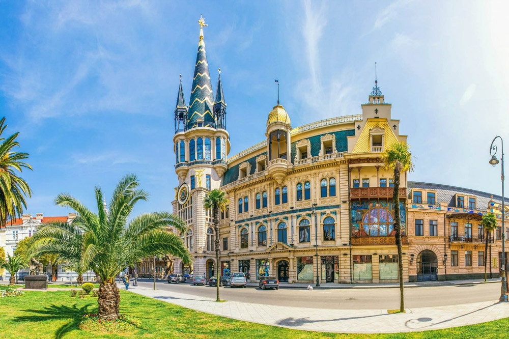 Downtown Batumi on the Black Sea coastline with the Adjara mountains entering the sea, seen on the Viticulture and Highlands West tour organized by John Graham Tours.