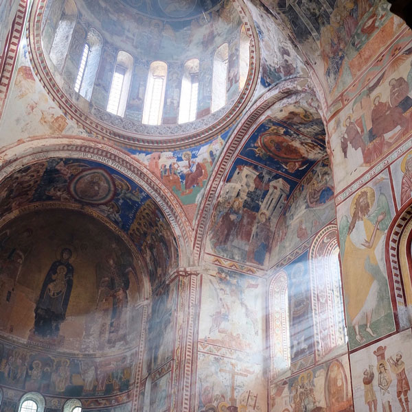 Interior frescoes and cupola dome of the UNESCO world heritage site Gelati Monastery and Academy. Seen on cultural tours organized by John Graham Tours.