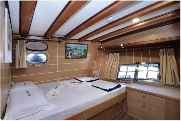 John Graham Tours Castles of Caria cruising tour. Image of the interior of a gulet charter boat cabin.